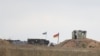 Armenia- A view shows Armenian border guard post next to the Azerbaijani border guard post on the road leading from Armenia to Nagorno-Karabakh, September 21, 2023.