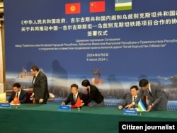 Officials of China, Kyrgyzstan, and Uzbekistan gathered in Beijing to sign an agreement related to the three-country railway on June 6, 2024.