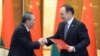 Chinese Premier Li Qiang and Belarusian Prime Minister Raman Halouchanka shake hands after signing new agreements in Minsk on August 22. 