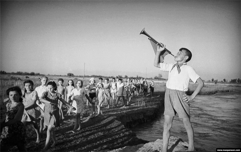 A young trumpeter heralds a children's group.Penson’s work was used by the Soviet press to illustrate the “new Uzbekistan” being reshaped under Moscow’s leftist ideology.