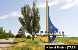 A sign marks the entrance to the Sea of Azov port city of Berdyansk, seen in June 2022.