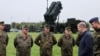 German Chancellor Olaf Scholz meets with members of the Patriot air-defense system unit as he visits the Cologne-Bonn Air Force on October 23.
