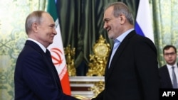 Масъуд Пизишкиён ва Владимир Путин.