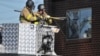 Americans Mourn 'Batman' Killings