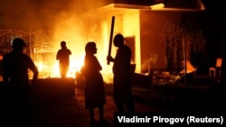 PHOTO GALLERY: Deadly Clashes As Kyrgyz Special Forces Storm Compound Of Former President (Click on the image to view the gallery.)