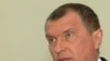 Igor Sechin emerges from a government session on May 15