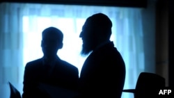 Jews pray in memory of those who died during the Holocaust at a synagogue in Moscow 