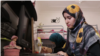 Afghanistan - Sisters Masooma and Shogoofa studied art in Kandahar, but are barred from going to classes by the Taliban - screen grab