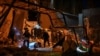 Rescuers work at the site where a building was destroyed during a Russian missile strike on Zaporizhzhya on August 9.