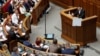 Ukrainian President Volodymyr Zelenskiy addresses parliament in Kyiv on August 29, announcing the country's new government.